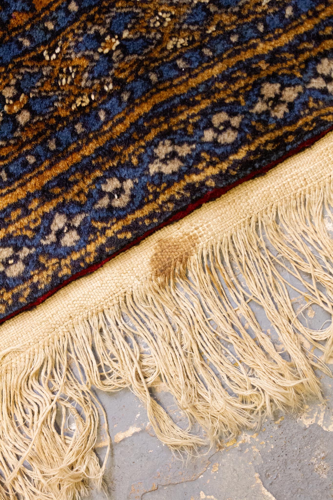 Antiek bruin Perzisch wollen vloerkleed met blauwe patronen