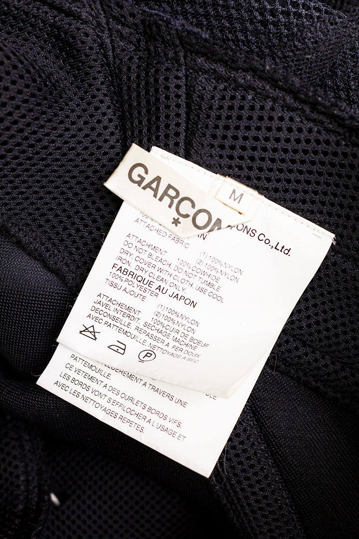 Comme des Garçons AD2004 asymmetrische geperforeerde scuba rok met tule