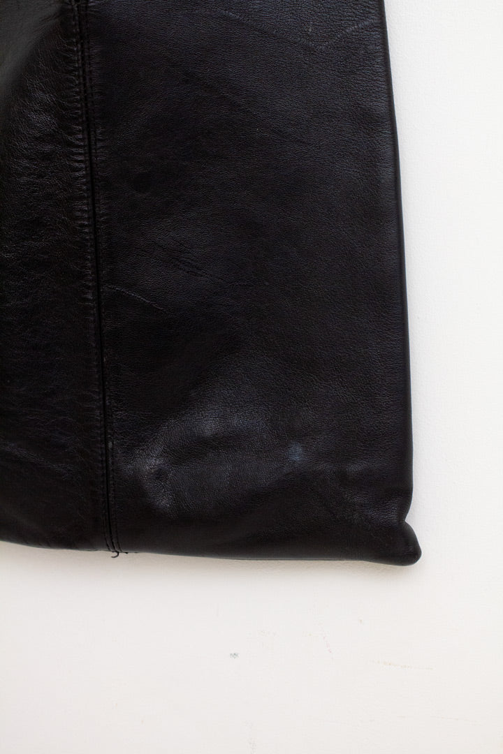 Lucy Jellema vintage tas minimalistisch ontwerp - zwart leer