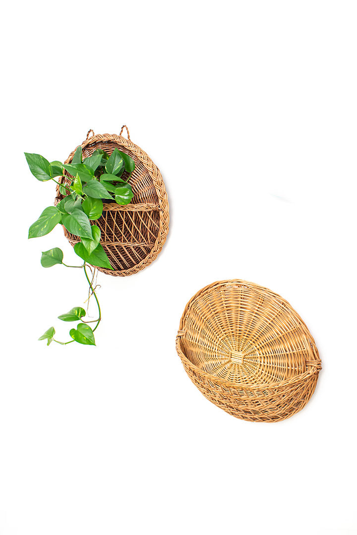 Ronde muurdecoratie van gevlochten rotan