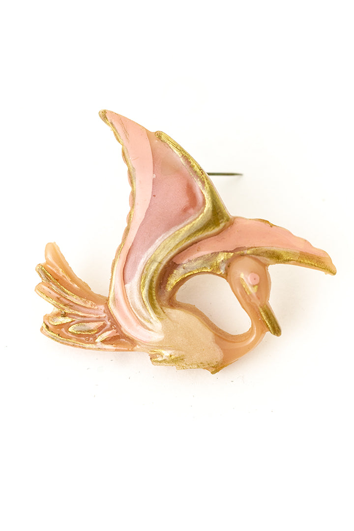 Vintage broche vogel van roze kunststof