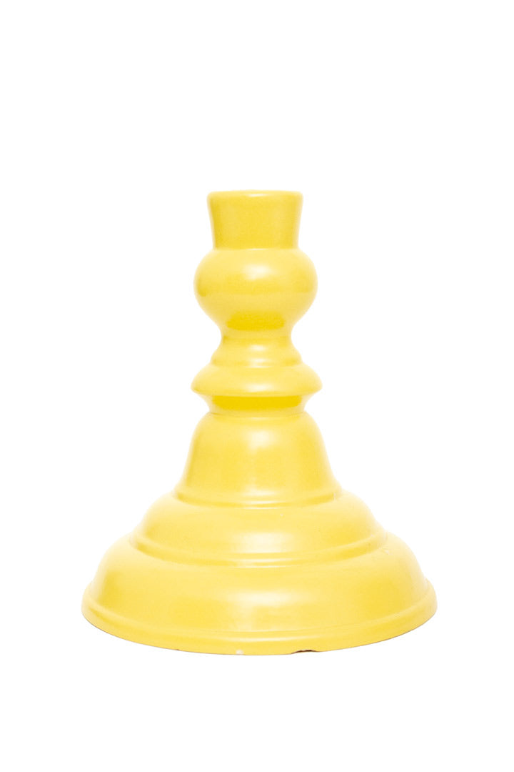 Vintage lichtgele keramieken kandelaar gegolfd