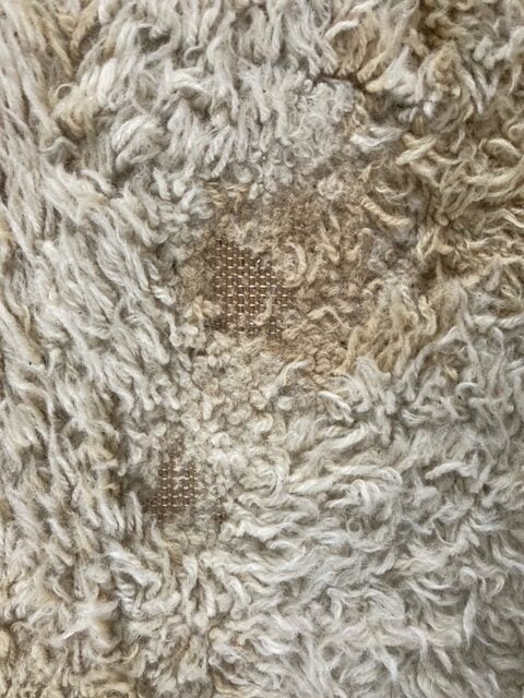 Seventies hoogpolig vloerkleed wol in bruine en crèmekleurige tinten