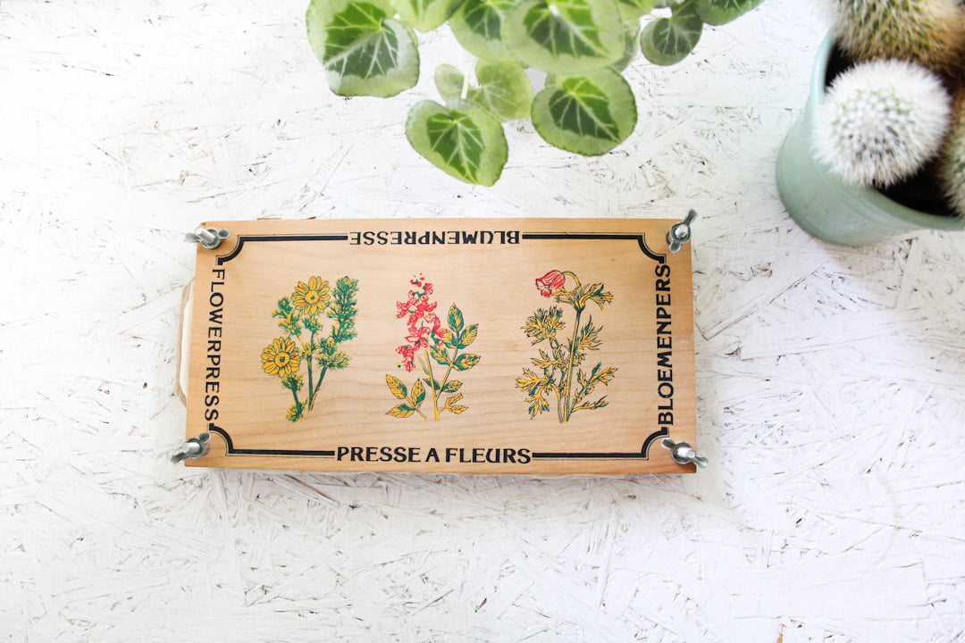Vintage bloemenpers
