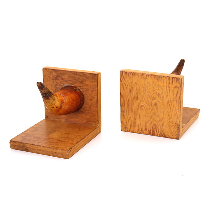 Vintage boekensteunen met hoorns