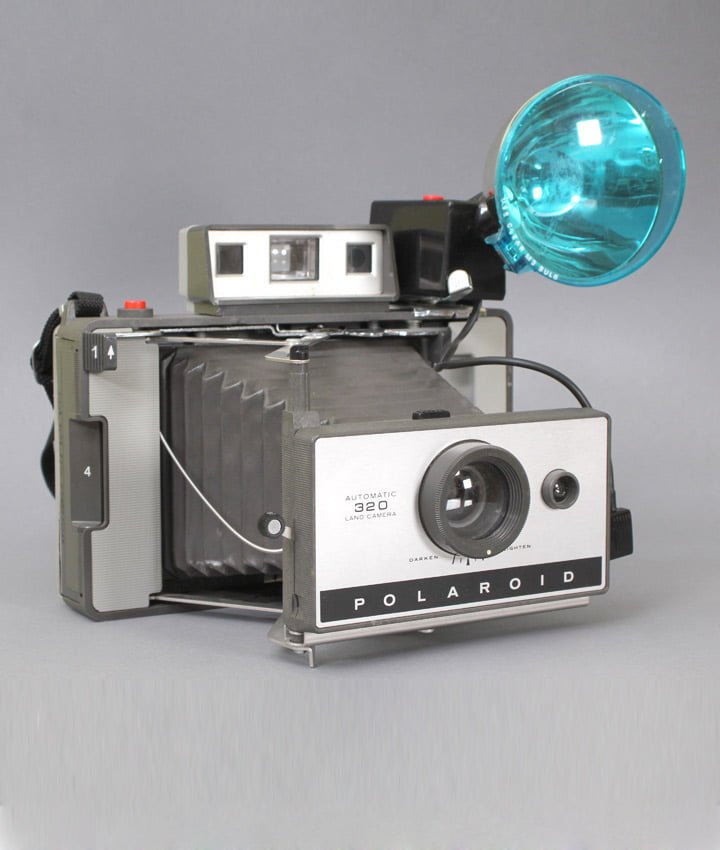 Polaroid 320 Land Camera + Polaroid 268 Flitser