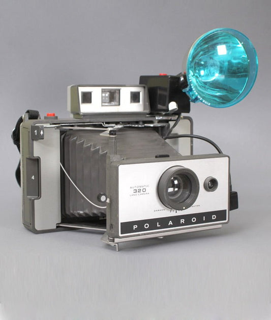Polaroid 320 Land Camera + Polaroid 268 Flitser