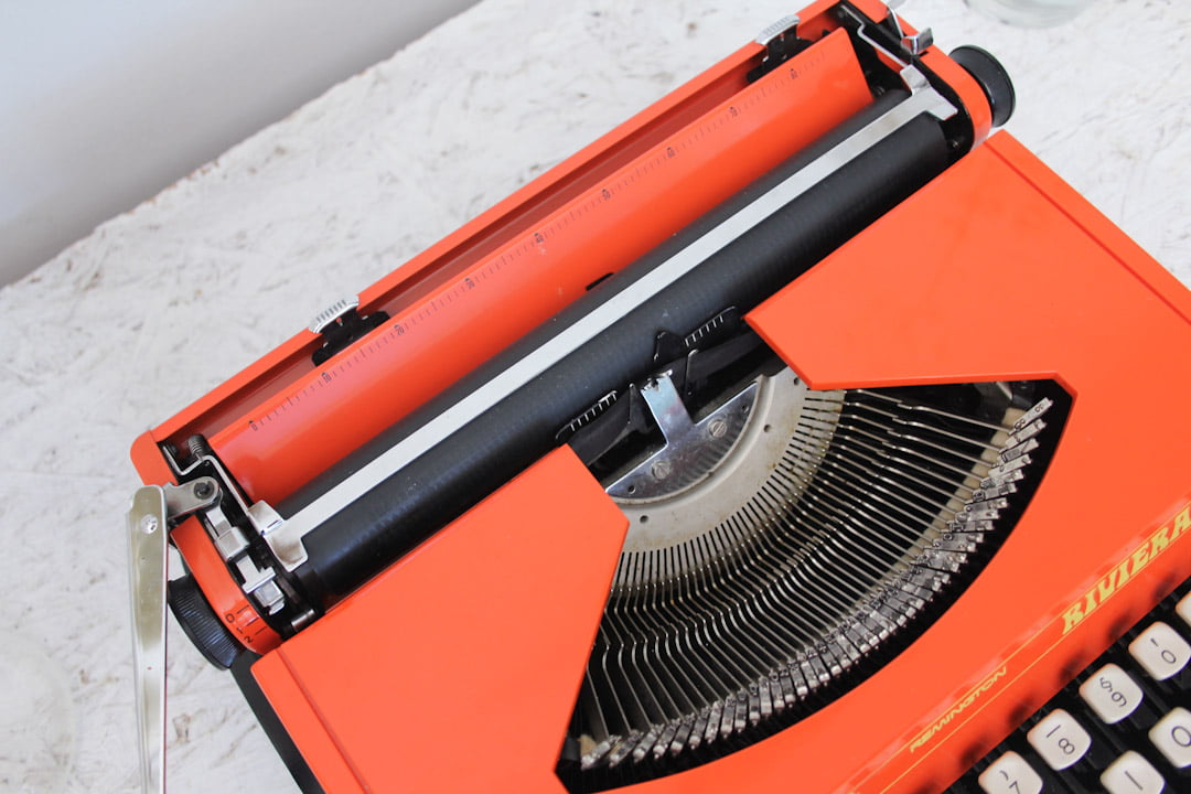 Remington Riviera oranje typemachine
