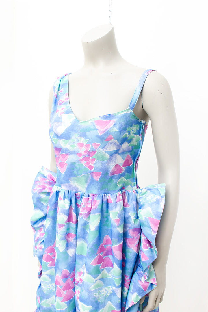 Asymmetrische vintage jumpsuit met ruches en vrolijke pasteltinten