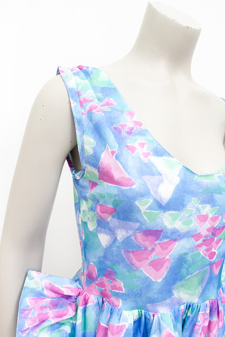Asymmetrische vintage jumpsuit met ruches en vrolijke pasteltinten