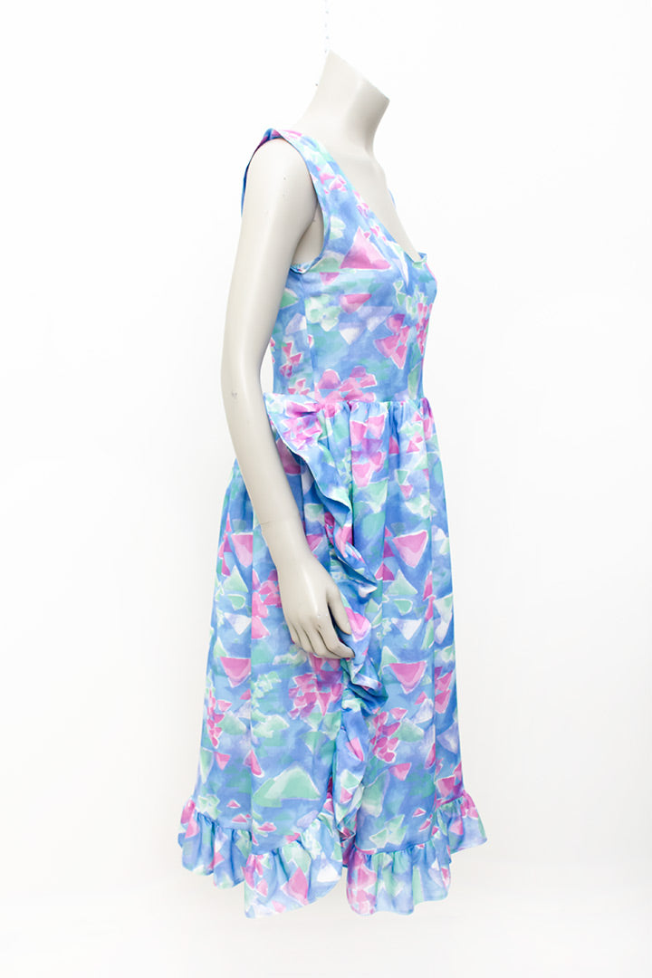Asymmetrische vintage jumpsuit met ruches en vrolijke pasteltinten