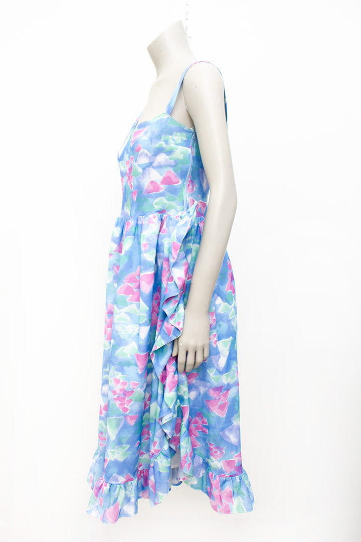 Asymmetrische vintage jumpsuit met ruches en vrolijke pasteltinten