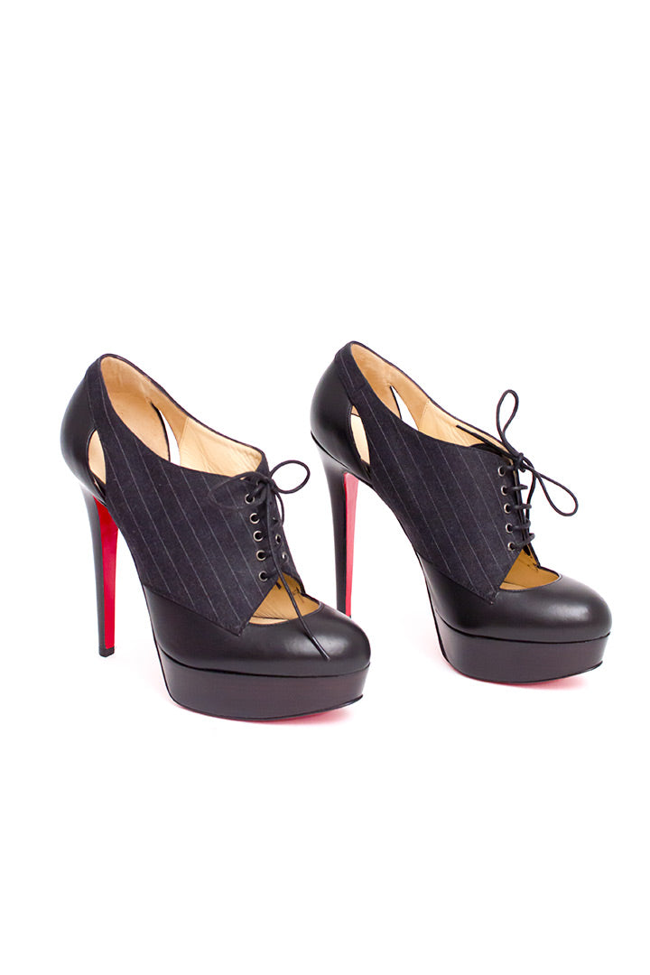 Christian Louboutin gilet pumps of veterlaarsjes