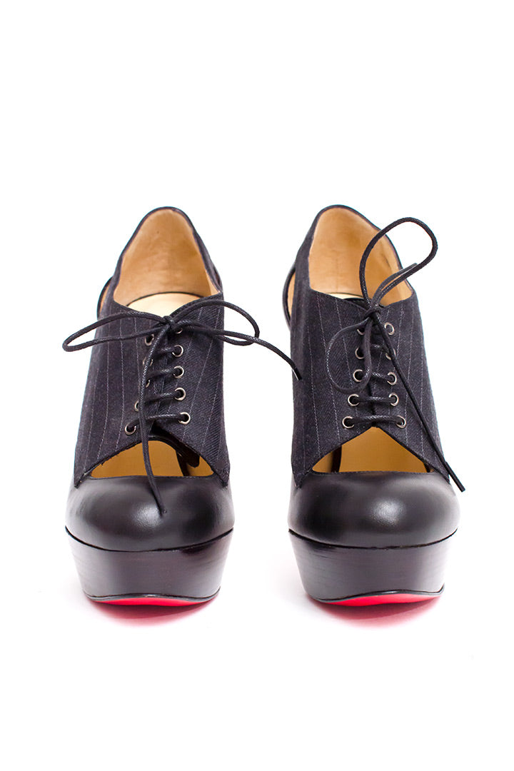 Christian Louboutin gilet pumps of veterlaarsjes