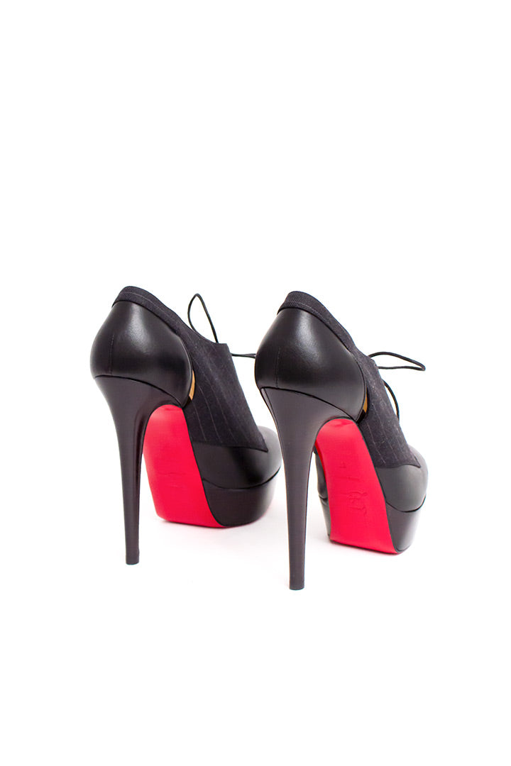 Christian Louboutin gilet pumps of veterlaarsjes