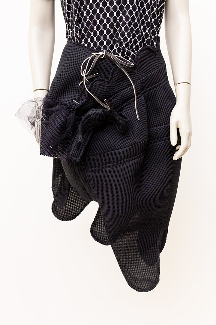 Comme des Garçons AD2004 asymmetrische geperforeerde scuba rok met tule
