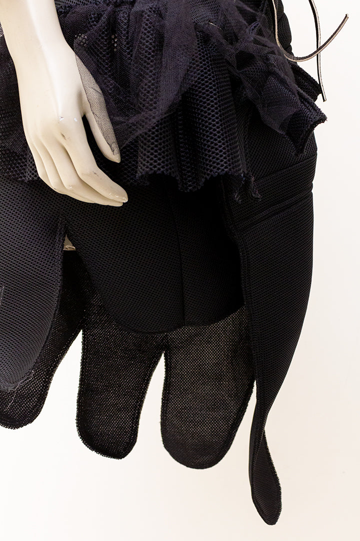 Comme des Garçons AD2004 asymmetrische geperforeerde scuba rok met tule