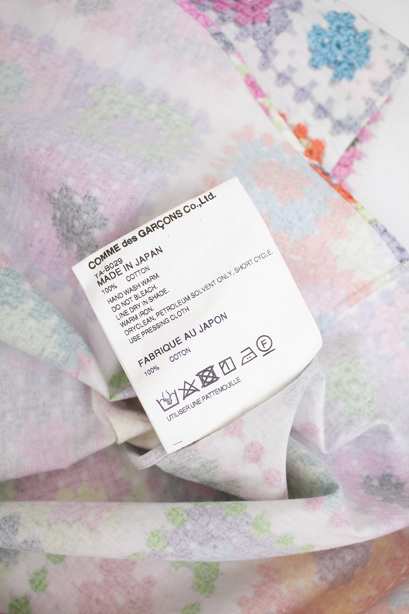 Comme des Garçons Tricot AD2017 blouse met patchwork print