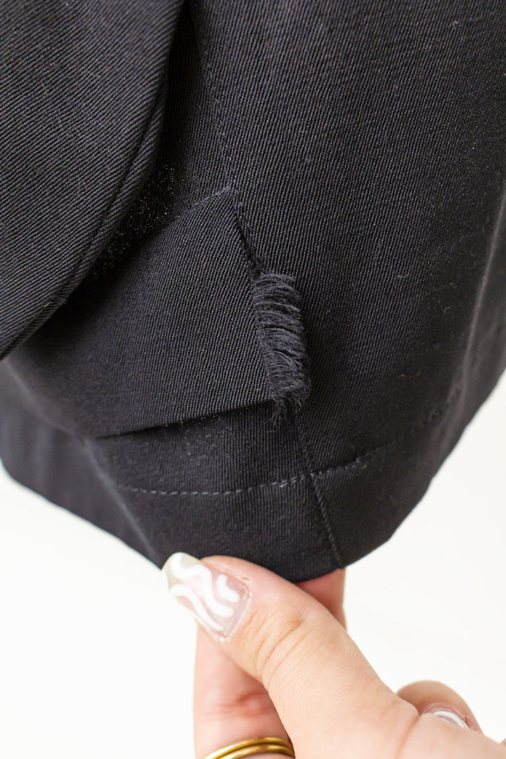Comme des Garçons zwarte wollen rok met elegante draperieën