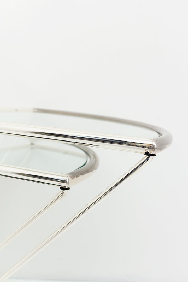 Draaibare glazen bijzettafel OMA-design met gietijzeren voet