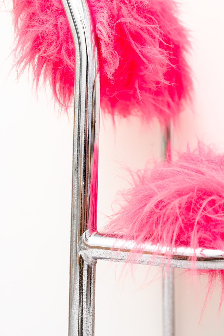Furry stoel met verchroomd buisframe neon roze