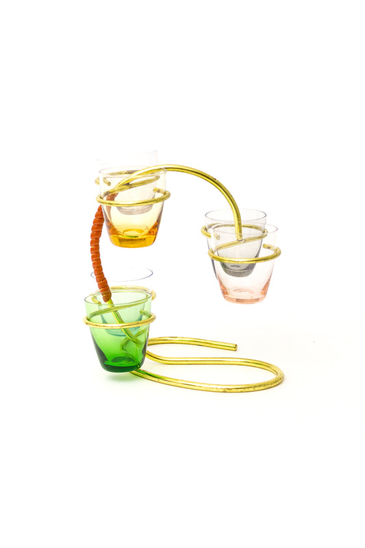 Gekleurde vintage shotglaasjes met messing standaard