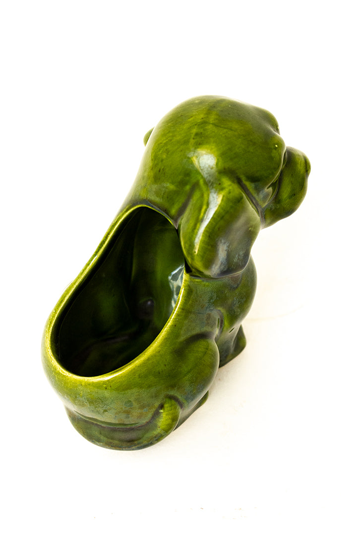 Groen keramieken bloempotje hond