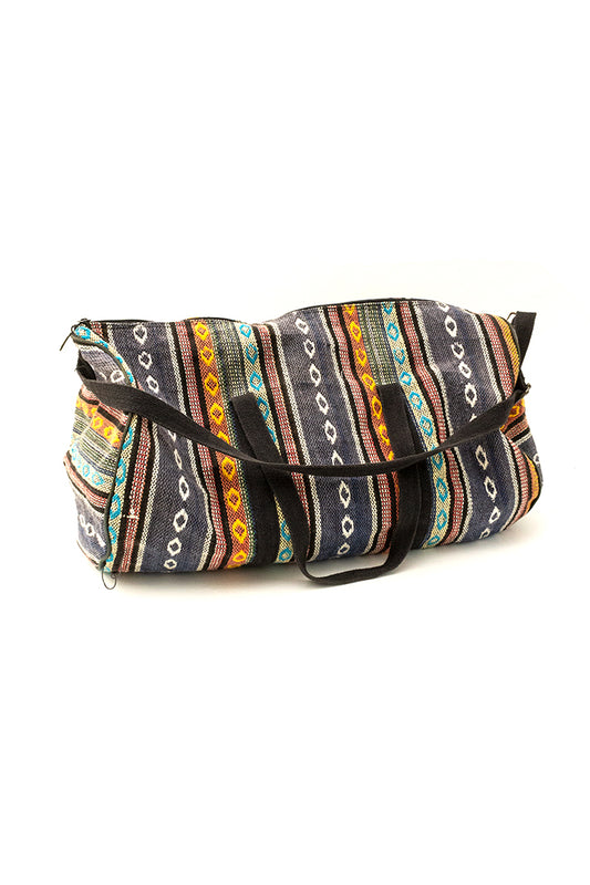 Grote vintage weekendtas Ikat met gekleurde banen