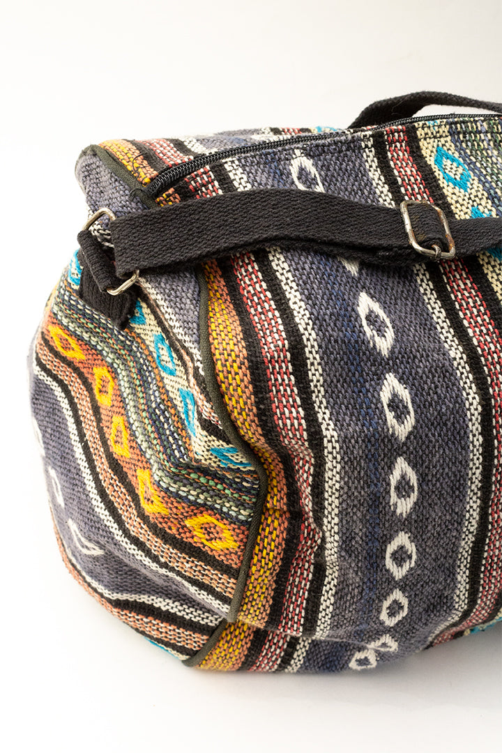 Grote vintage weekendtas Ikat met gekleurde banen