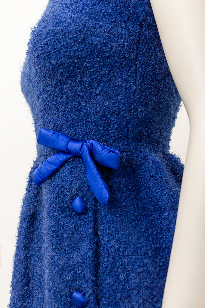 Jaren 50 bouclé jurk van donkerblauw wol met strikje Bonwit Teller