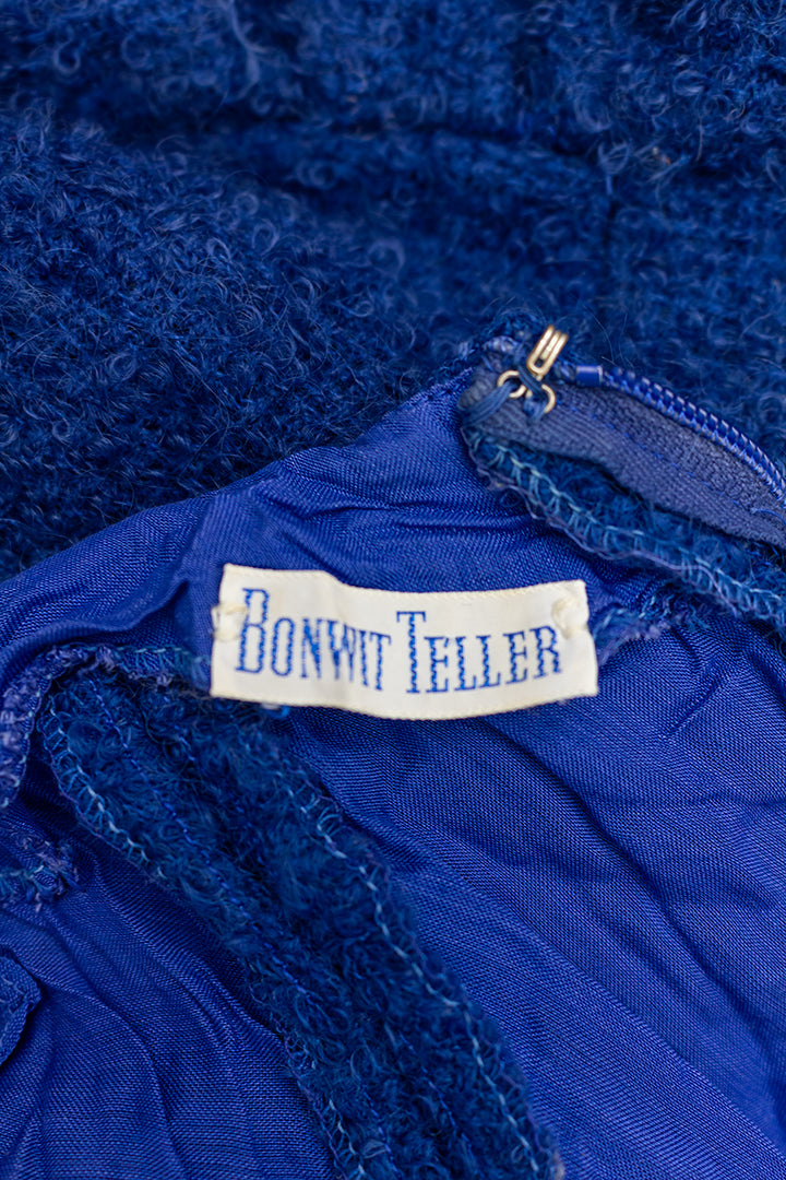 Jaren 50 bouclé jurk van donkerblauw wol met strikje Bonwit Teller