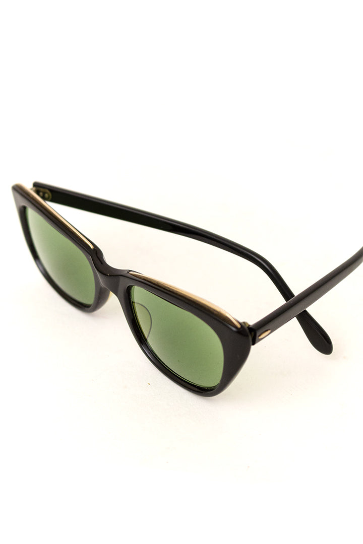 Jaren 50 cat eye zonnebril met zwart montuur en metalen detail