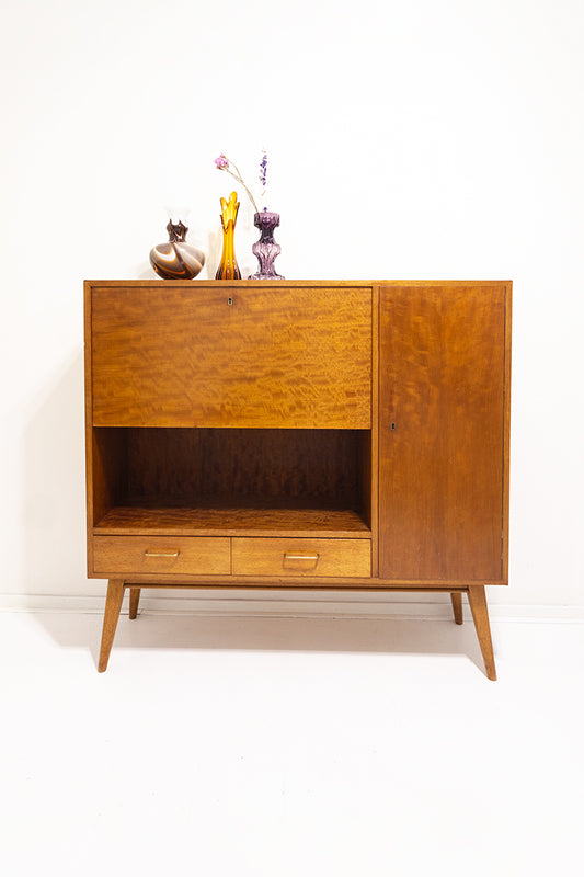 Jaren 60 kast of secretaire van teak-fineer met taps toelopende pootjes