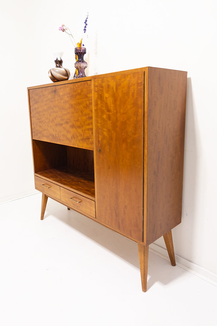 Jaren 60 kast of secretaire van teak-fineer met taps toelopende pootjes