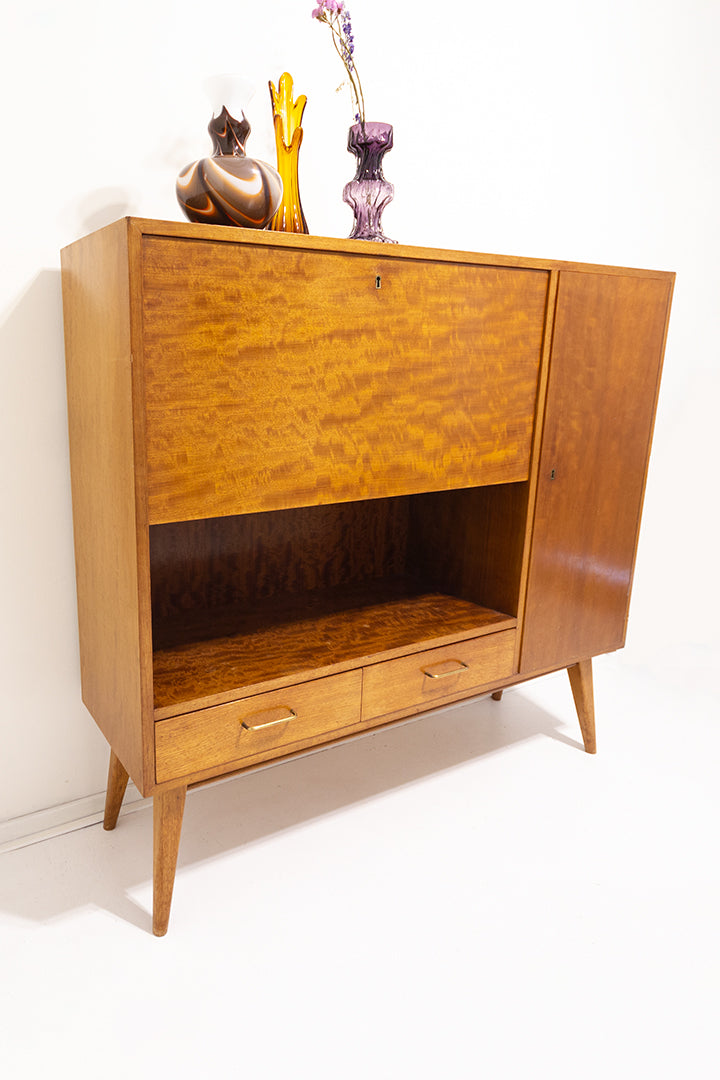 Jaren 60 kast of secretaire van teak-fineer met taps toelopende pootjes