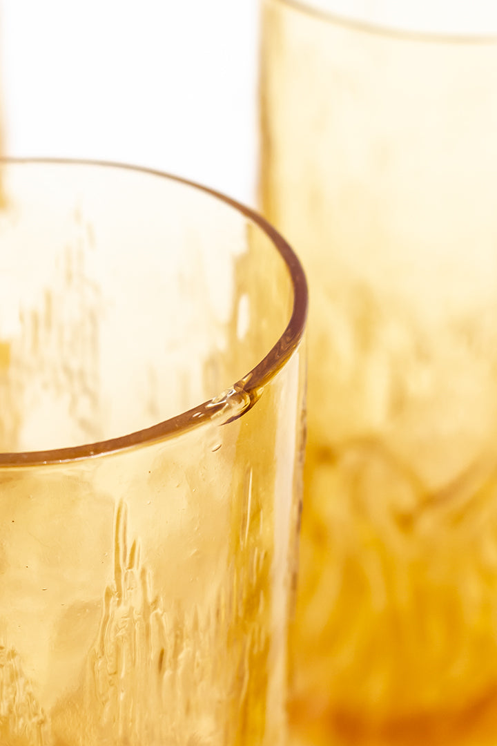 Jaren 70 longdrink glazen amberkleurig met schors reliëf - set van 4