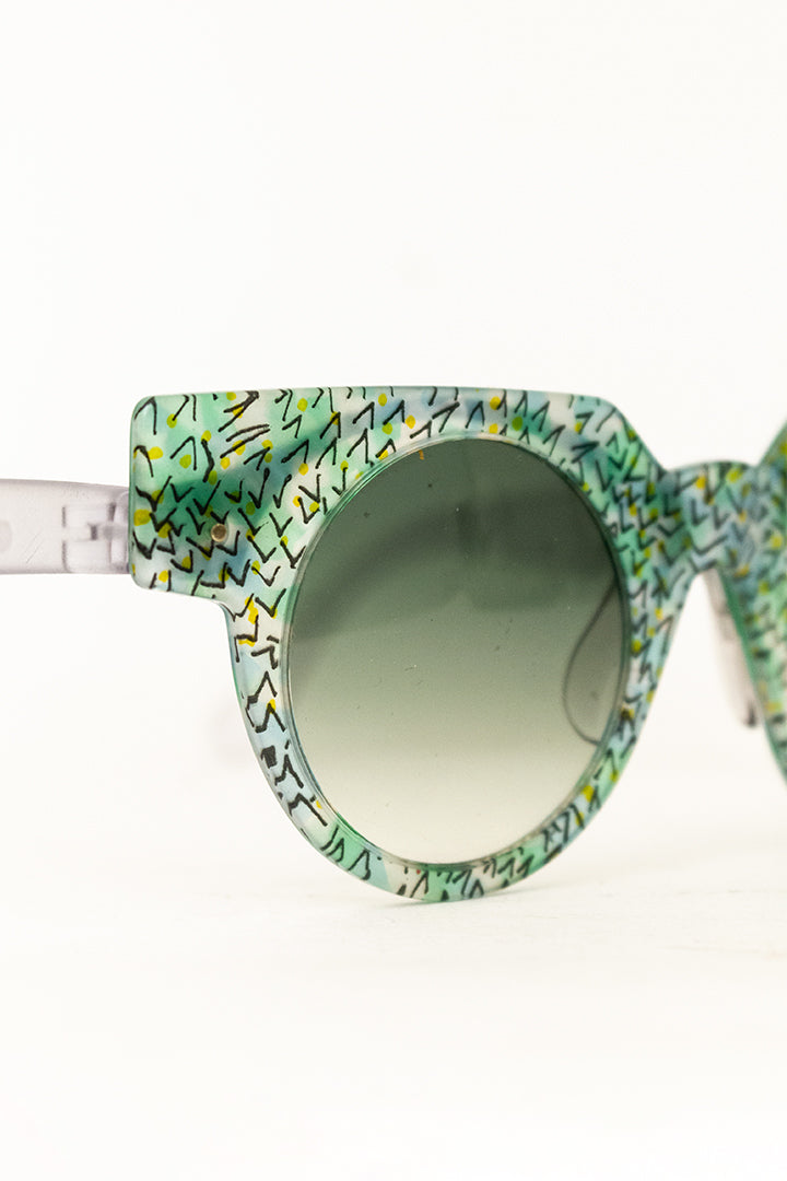 Jaren 90 Swatch zonnebril Sea Garden met verwisselbaar frontje en originele hoes