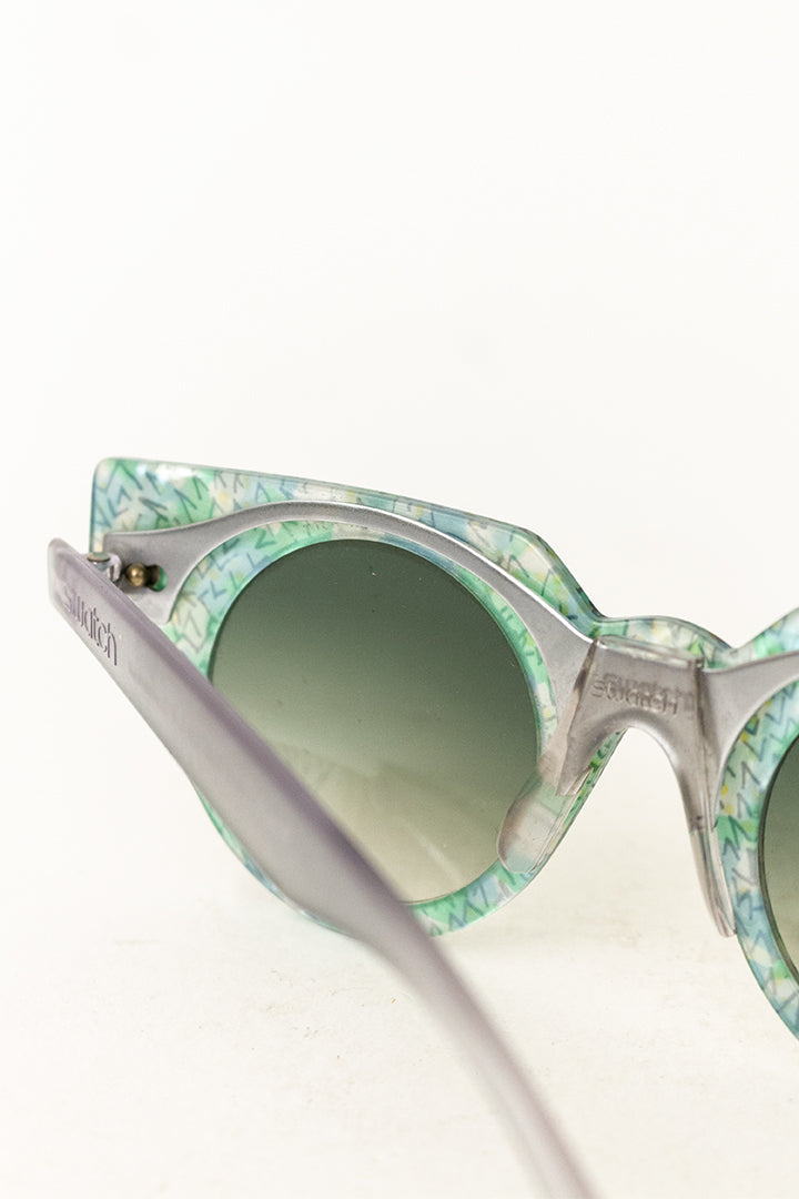 Jaren 90 Swatch zonnebril Sea Garden met verwisselbaar frontje en originele hoes