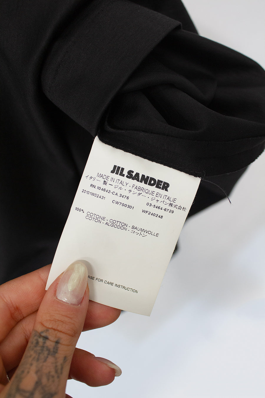 Zwarte asymmetrische Jil Sander jurk met hals detail