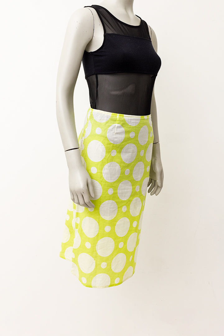 Limoengroene vintage kokerrok met witte polkadots