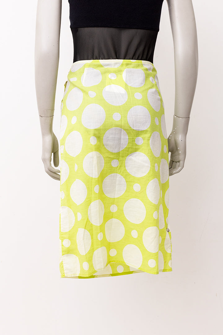 Limoengroene vintage kokerrok met witte polkadots