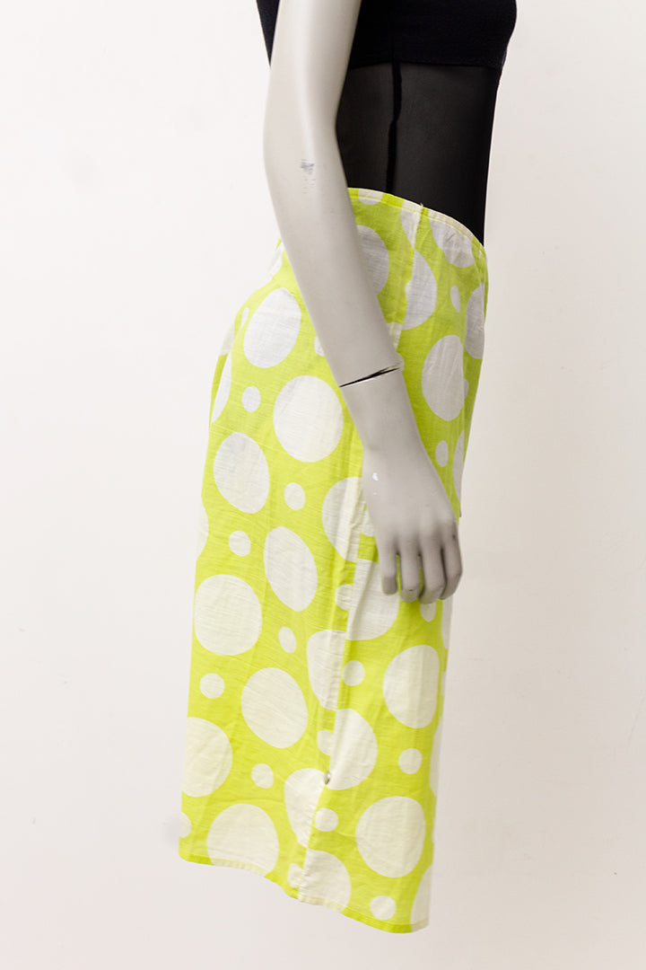 Limoengroene vintage kokerrok met witte polkadots