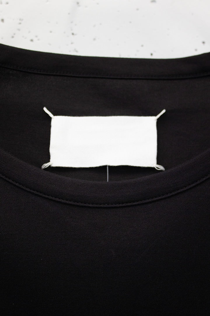 Margiela white label SS10 mouwloze jurk met 3D gepoft detail