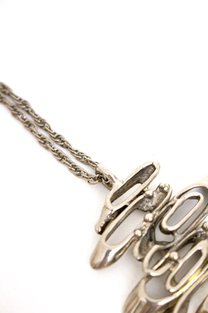 Jaren 70 modernistisch ketting met abstracte ovale hanger