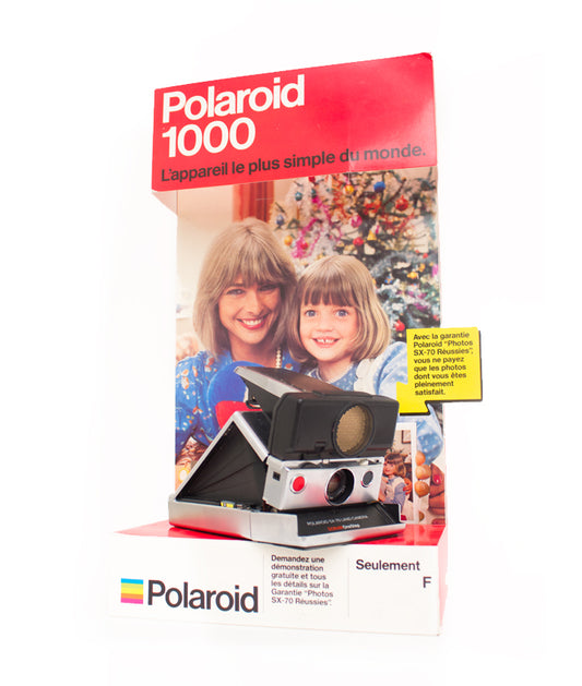 Polaroid SX-70 Sonar OneStep + 1000 display