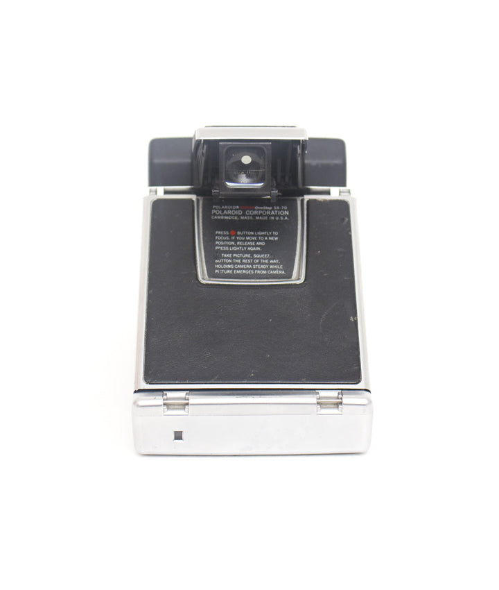 Polaroid SX-70 Sonar OneStep + 1000 display