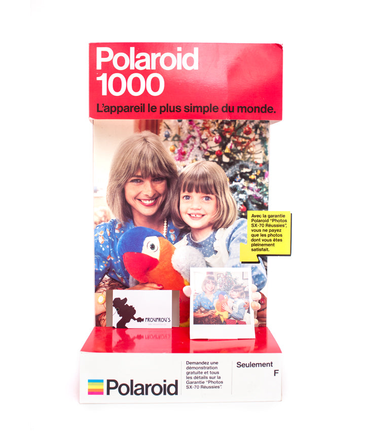 Polaroid SX-70 Sonar OneStep + 1000 display