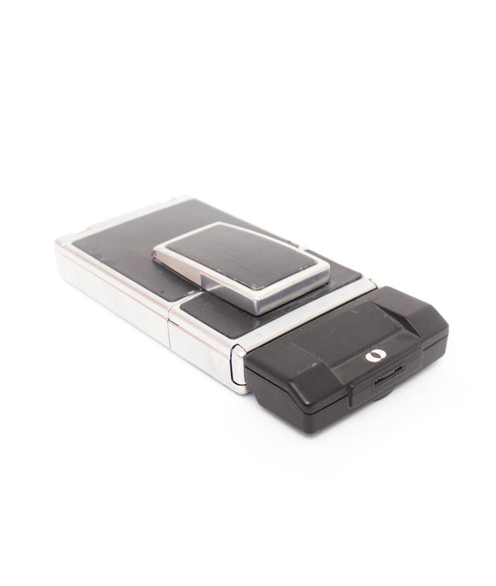 Polaroid SX-70 Sonar OneStep + 1000 display