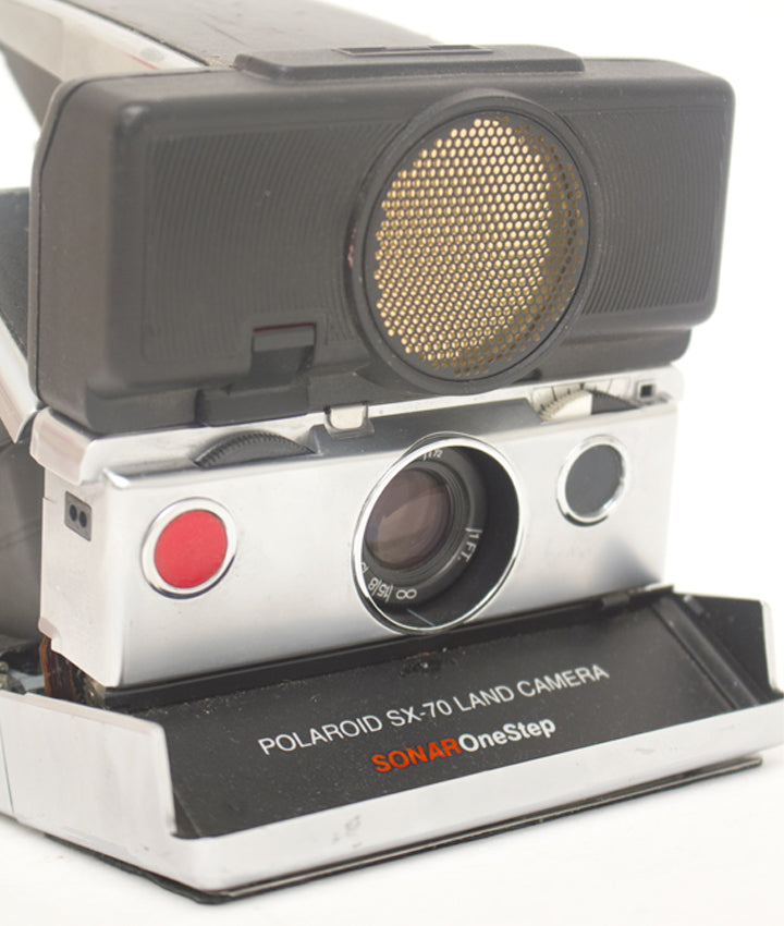 Polaroid SX-70 Sonar OneStep + 1000 display