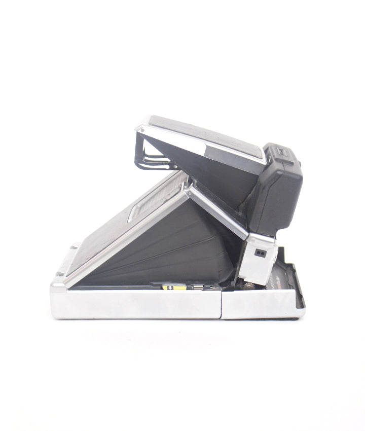 Polaroid SX-70 Sonar OneStep + 1000 display